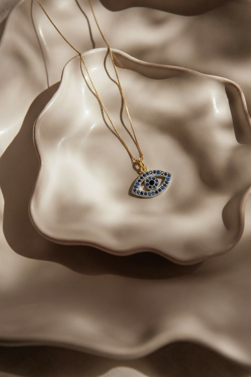 European and American fashion hip-hop color enamel plating 18K gold devil's eye pendant